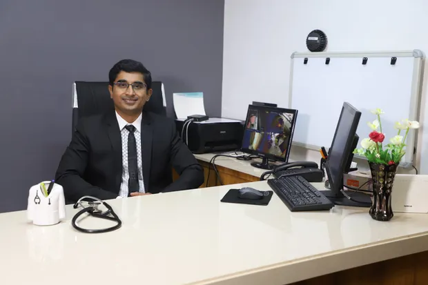 Dr. Ravindra Sangolkar at his consultation desk at Sangolkar Heart Care Center, Sangli